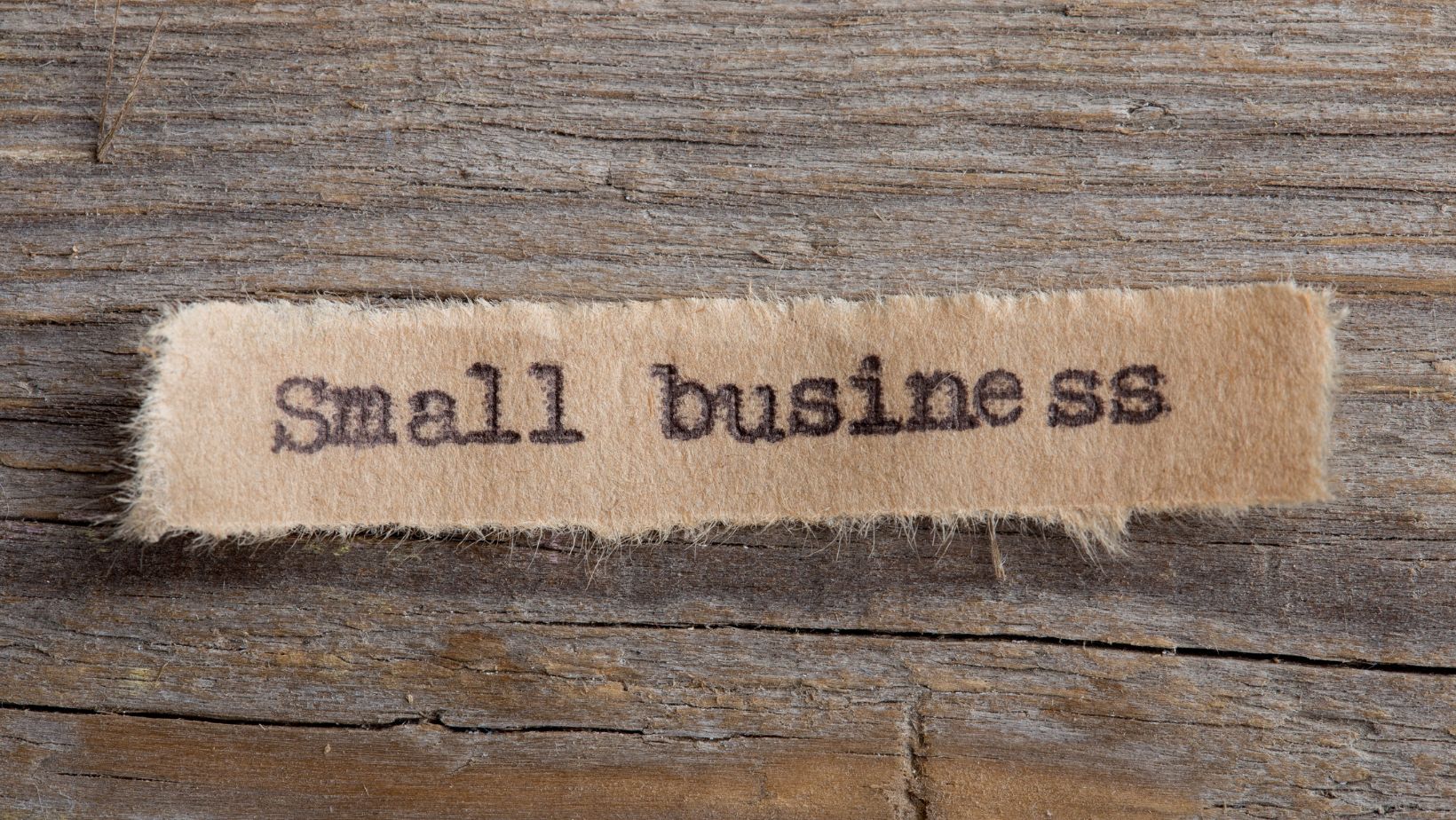A piece of paper with the text "Small Business"